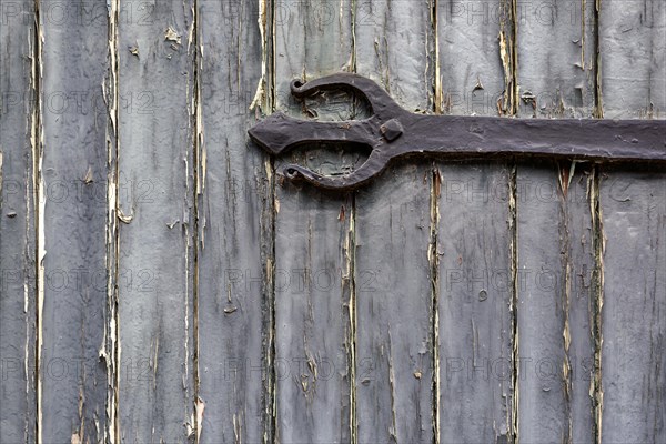 Old wooden door with iron fittings