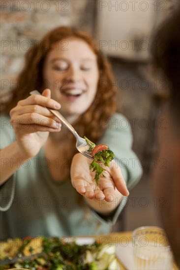 Close up blurry woman with food