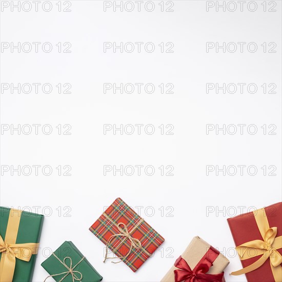 Flat lay christmas gifts white background with copy space