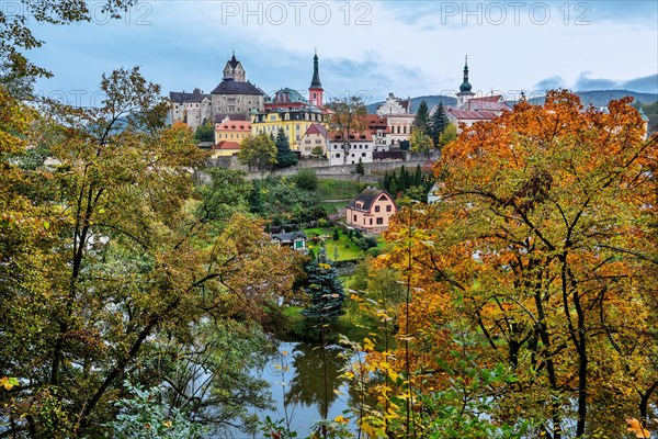 Old town with the castle above the Eger in autumn