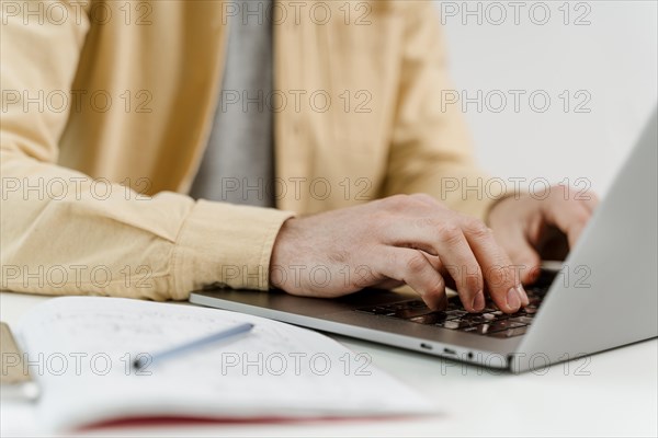 Close up man with laptop