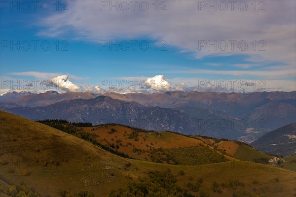Aerial View over Beautiful Mountainscape with Clouds in a Sunny Day From Monte Generoso