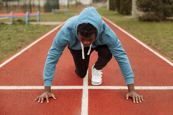 Active teenager jogging outdoors