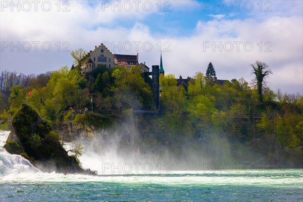 Rhine Falls and Swiss Flag with the Castle Laufen at Neuhausen in Schaffhausen