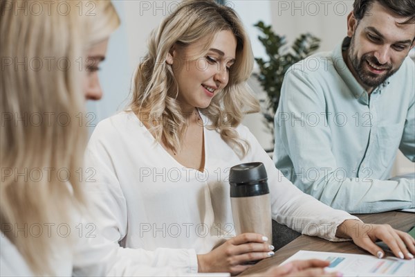 Job colleagues working drinking coffee