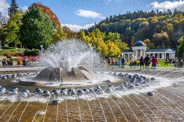 Singing fountain in autumn spa park