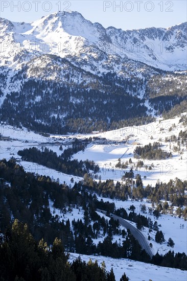 Panoramic of the snow-capped Pyrenees mountains in Andorra during winter