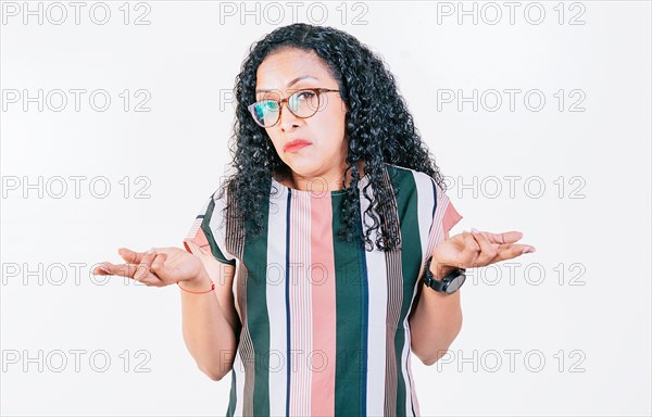 Afro girl with puzzled face frowning. Puzzled afro woman making hand gestures isolated. Puzzled people gesturing with hands
