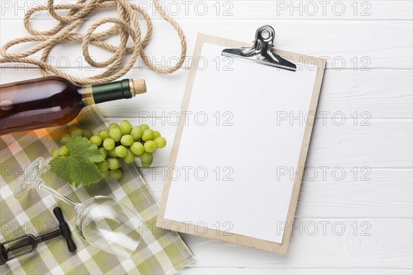 Clipboard mock up with white wine