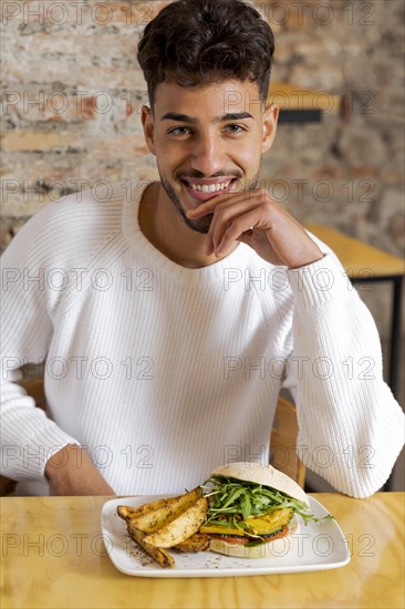 Medium shot smiley man with food 2