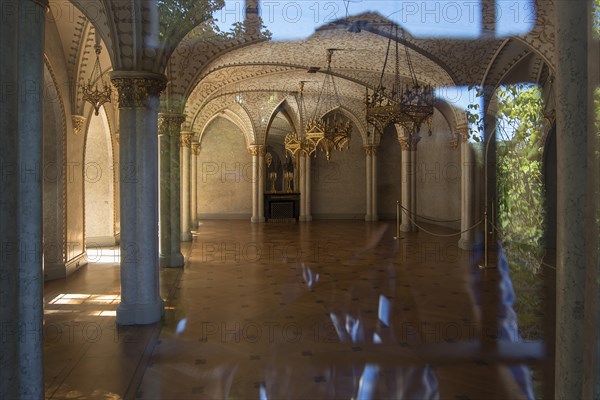 View through a window into the castle hall of Rosenau Castle