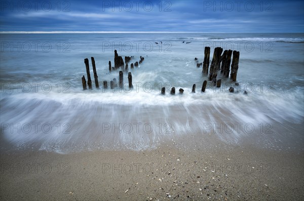 Remains of an old weathered groyne