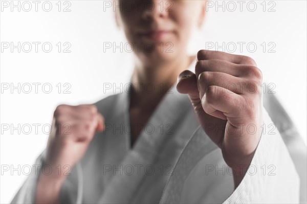 Close up punch karate woman