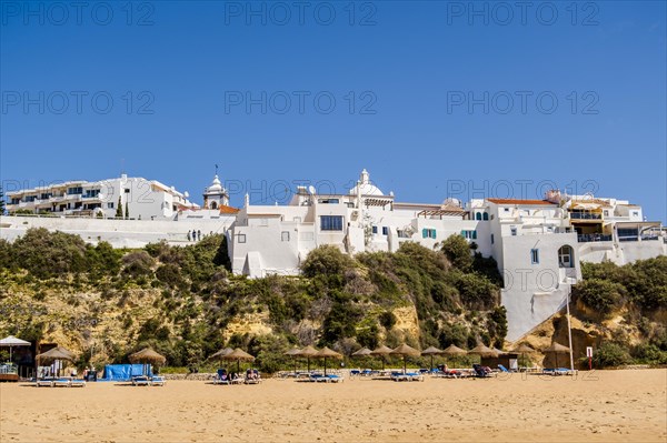 Awesome view of Albufeira whitewashed houses on cliff