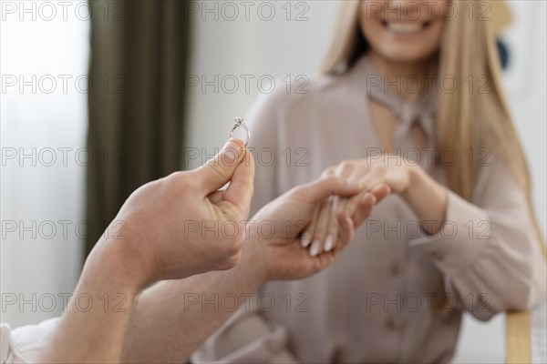 Close up happy woman with ring