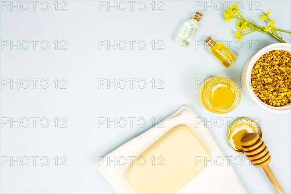 Overhead view aromatherapy ingredient blue background