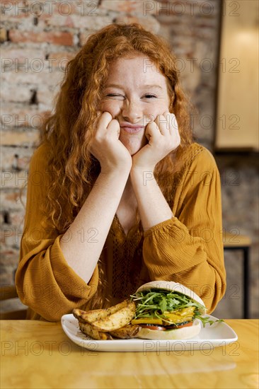 Medium shot vegetarian woman with food