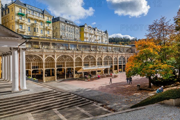 Spa promenade with spa colonnade in the autumnal spa park