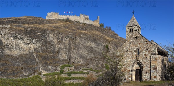 Chapel with Tourbillon Castle on a hill in Sion