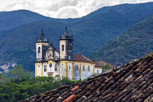 Old baroque church among the mountains in the city of Ouro Preto in Minas Gerais