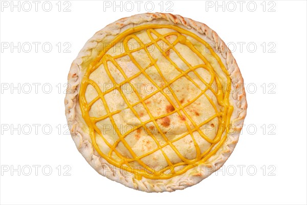 Top view of round closed pizza with chicken and mustard sauce isolated on white