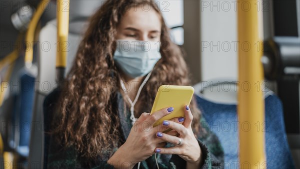 Blurred woman travelling with bus