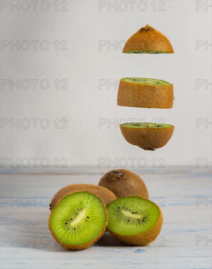 Fresh kiwis sliced on a plate