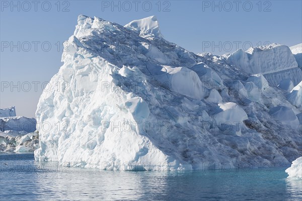 Huge iceberg in the UNESCO World Heritage Ilulissat Icefjord seen from a boat. Ilulissat