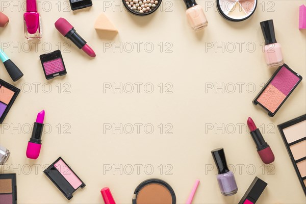 Eye shadows with lipsticks beige table