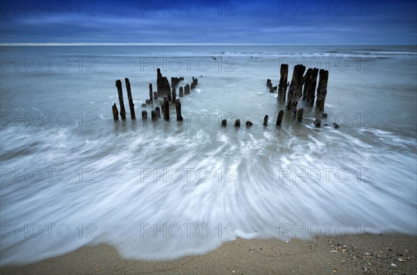 Remains of an old weathered groyne