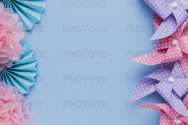 Arrangement pinwheel beautiful flower cutout blue background