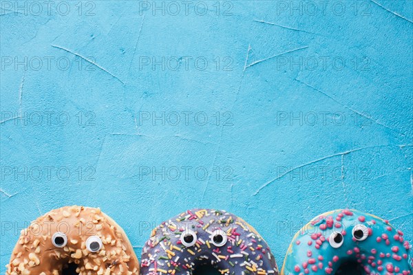 Donuts with eyes close up