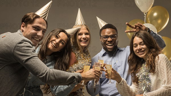 Group friends celebrating new year concept