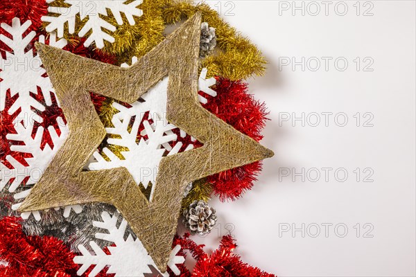 Tinsel garlands with snowflakes and star