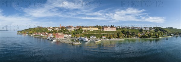 Aerial panorama of the town of Meersburg with the historic old town harbour and lake promenade