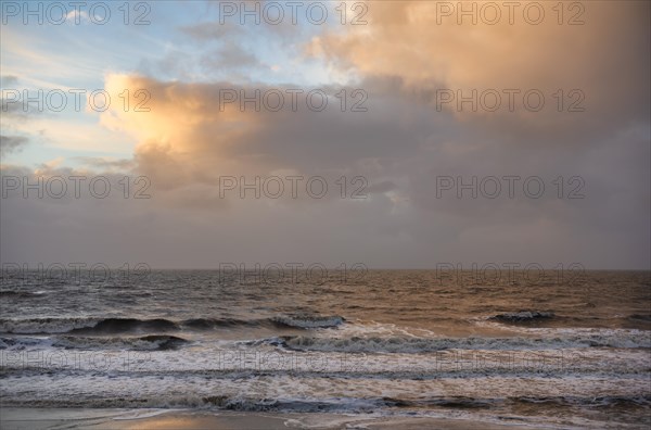 Sea and clouds in the evening light