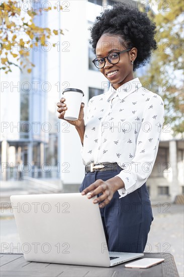Low angle woman working outdoor