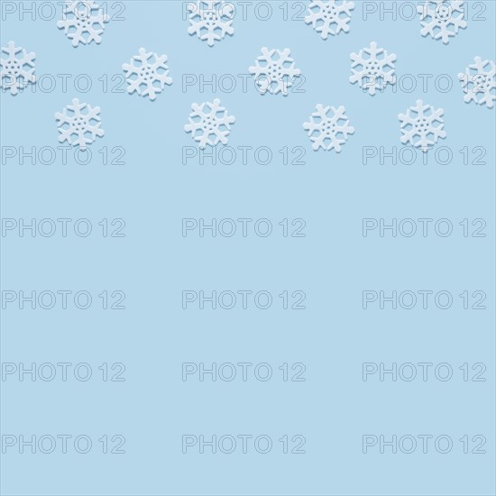 Snowflake baby blue background with copy space