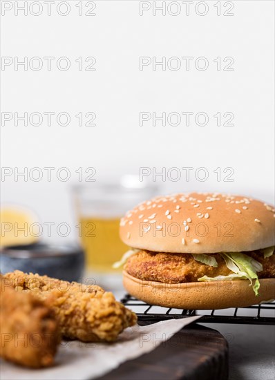 Front view fried chicken pieces burger