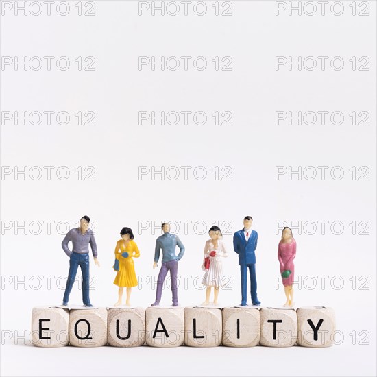 Equality written wooden cubes people