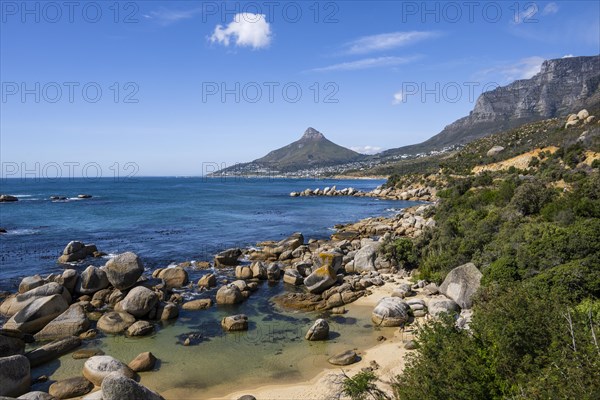 Atlantic Ocean with Lion's head and Table Mountain from Llandudno beachCape Town