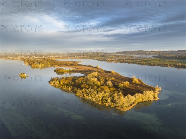 Aerial view of the Mettnau peninsula in western Lake Constance illuminated by the morning sun