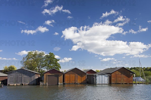 Wooden boat houses on the banks of the Plauer See at Plau am See
