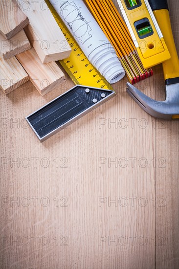 Variation of working tools on a wooden panel in vertical design Construction concept