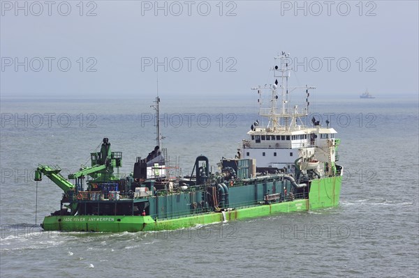 The dredger Jade River on the North Sea