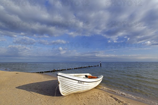 White fishing boat in the dunes along the Baltic Sea at Bansin