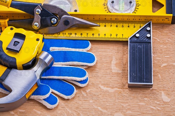 Brown wooden board with collection of building tools Maintenance concept