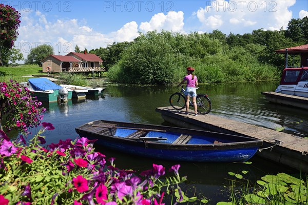 Cyclist in the harbour of Minge