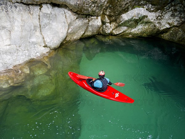 Kayakers on the emerald green Soca River