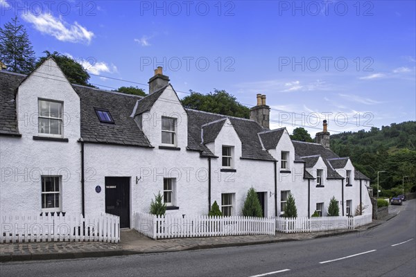 Row of white houses in the village Kenmore